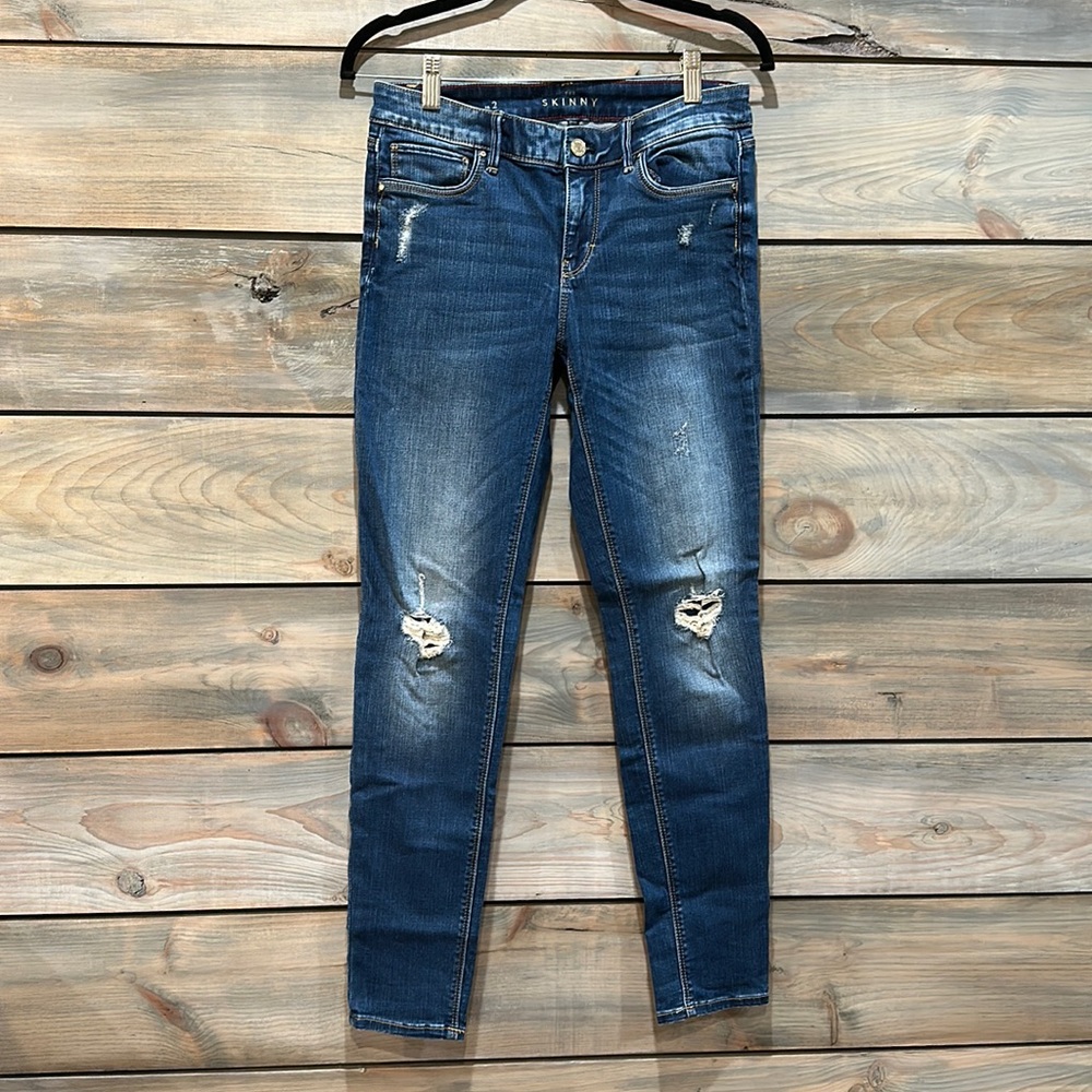 White House Black Market distressed skinny jeans. Like new worn once.